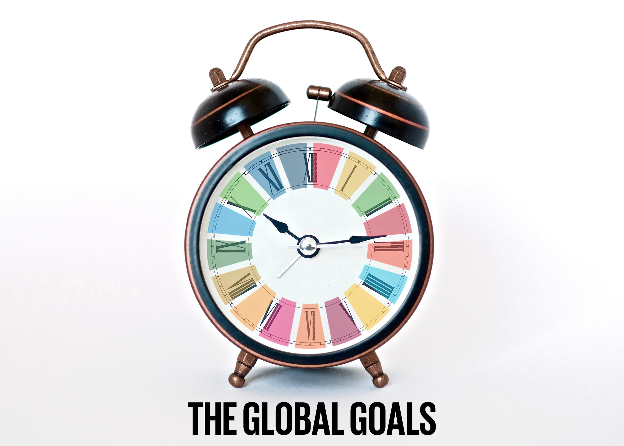 Sustainable Development Goals on an alarm clock“>
           <div class=