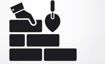 Illustration of hand laying a brick foundation